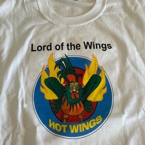 NEW Hot Wings Tee Shirt. Size L G G,  50% cotton 50% Polyester, made in Haiti.